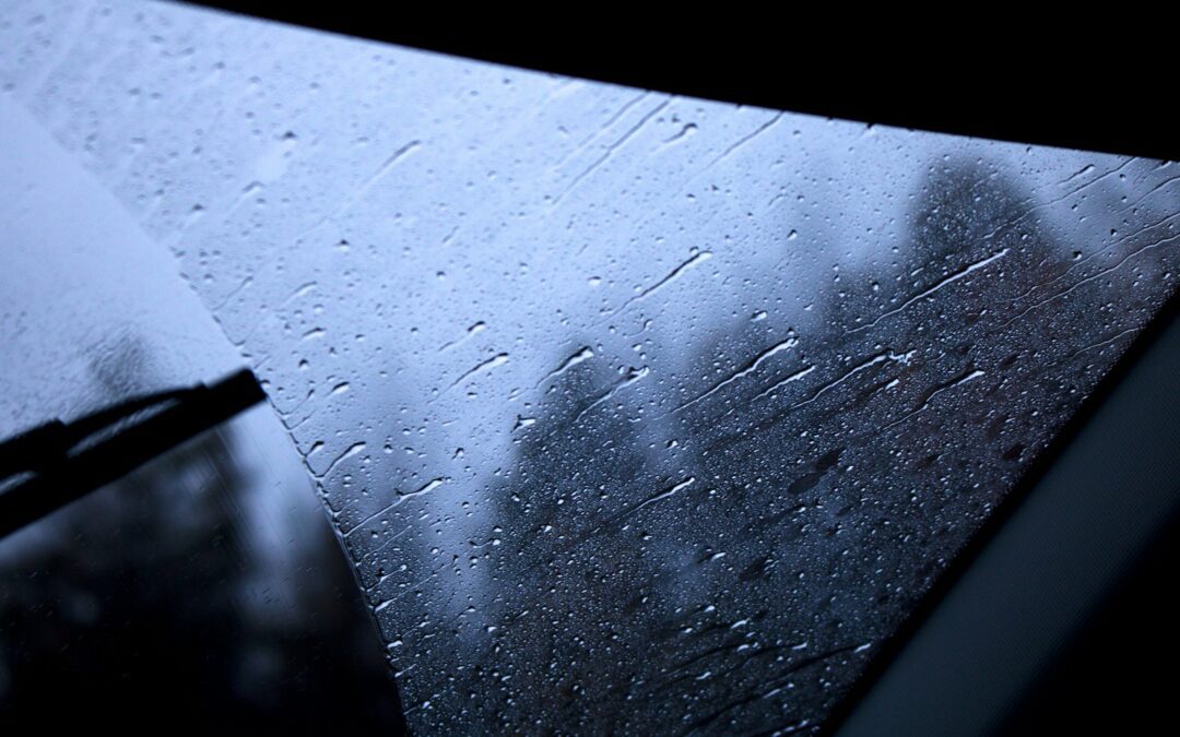 a window with rain drops on it